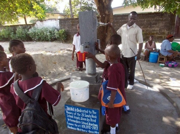 NMS_Students_Learn_How_Reed_Project_Created_A_Well_In_Liberia_New_Life_Academy_students liberia